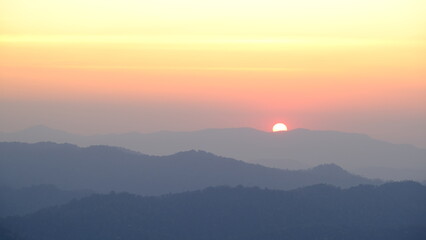 Fototapeta premium Sunset over the mountains in the evening.