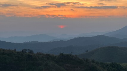 Fototapeta premium Sunset over the mountains in the evening.