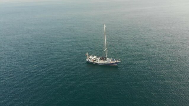 Aerial view of sailing yacht anchored in calm Indian ocean, Sri Lanka