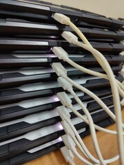 Several tablets on the table in the office on recharging