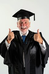A happy energetic older man graduating from college on a white background