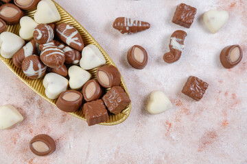 Handmade chocolate with pistachios, dark and milk chocolate pieces.