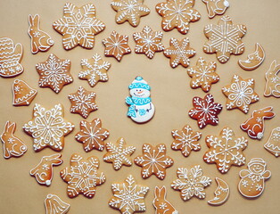 Assorted Decorated Gingerbread Cookies on Brown Paper