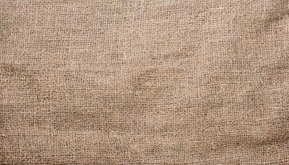 Fototapeta na wymiar beige canvas texture background of cotton burlap natural fabric cloth in old aged brown