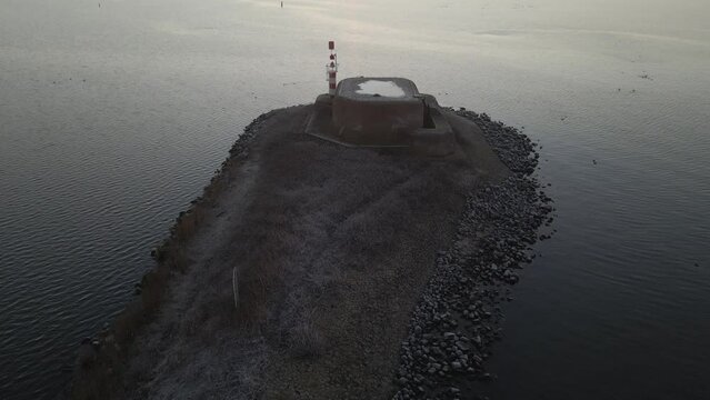 Aerial View of world war two bunker during sunrise, kornwerderzand, Netherlands