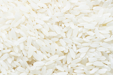 turkish raw white rice grains texture background, healthy food uncooked legumes concept