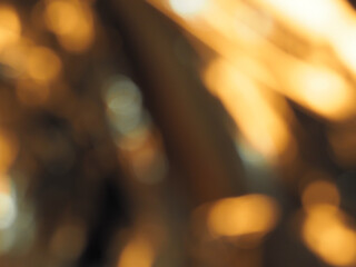 Fototapeta premium Blurred golden light for an abstract luxury background