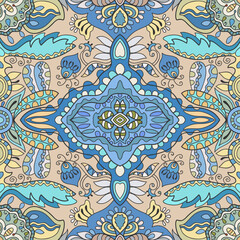 Hand drawn seamless graphic pattern, colorful artistic background with floral and geometric elements. Doodle ethnic mandala ornament for textile fabric, paper print. Surface texture 