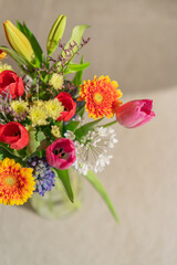 Radiant bouquet embodying the vibrancy of nature with the spring tulips, the sunny appeal of gerberas and the delicate charm of hyacinths