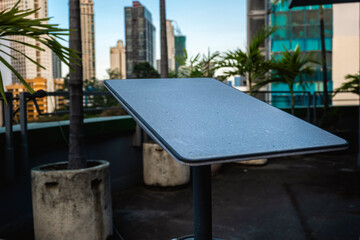 A weathered satellite dish on a buildings balcony to receive low orbit satellite internet or LEO.