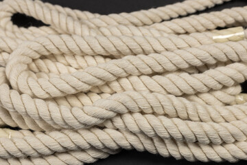 Rope detail on dark. Close-up of its rope texture Depth of field minimalism ropes