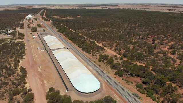 Aerial view of small site grain storage and bulkheads, Outback, Australia
