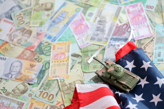 Tank on United States flag on many banknotes of different currency. Background of war funding and military support price for United States of America