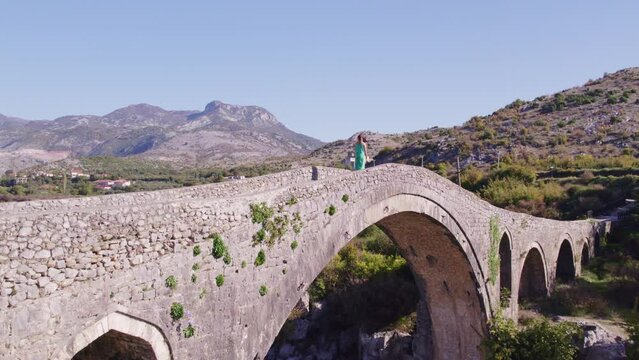 Aerial view of old ottoman mesi bridge over the Kir river, Shkoder, Albania