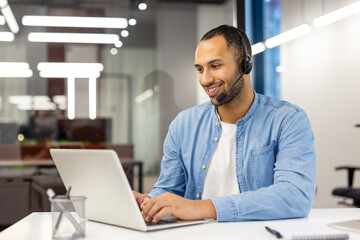 Smiling customer service representative with headset in office