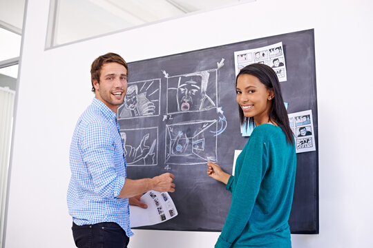 Business people, portrait and creative by chalkboard in office for storyboard drawing or animation illustration. Graphic design, man or woman with teamwork by blackboard or smile for cartoon planning