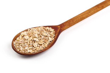 Oat flakes on a wooden spoon, isolated on white background.