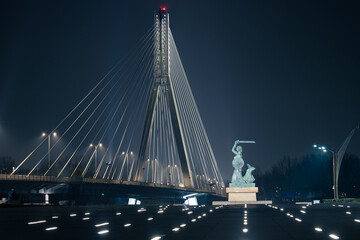 Bridge and the Mermaid of Warsaw at night