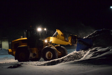 Blue Front End Loader Snow Pusher Stacking Now at Night - obrazy, fototapety, plakaty