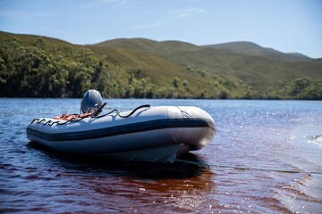 tinny dinghy boat on a river in a national park in the australian bush, On the beach in summer in...