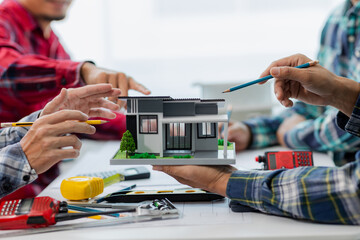 Engineer office team, director about house plans with green printing and home, engineer and architect concepts, architect engineer,