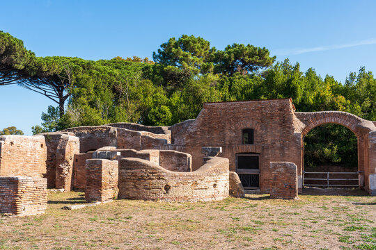 Ruins of ancient roman town at archaeological park in the italian city of Ostia