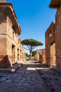 Street view of ancient roman town at archaeological park in Italy