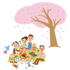 桜の木の下でピクニックを楽しんでいる三世代家族