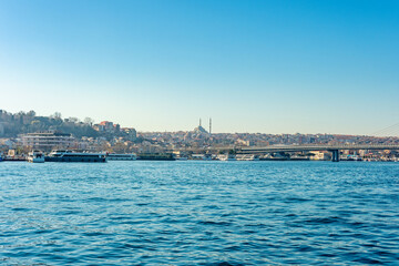 Fototapeta premium Landscape of Istanbul city with bridge and sea boats.