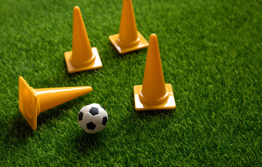 ball and cones in training ground , football manager tactic , soccer school