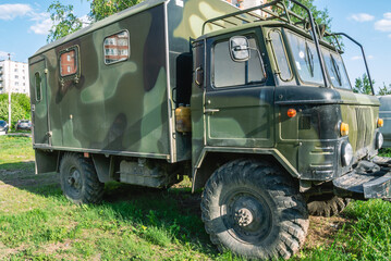 Military cross-country vehicle with kung. Soviet Army khaki truck. A closed van of an old military truck. Military truck for transporting military. Army equipment.