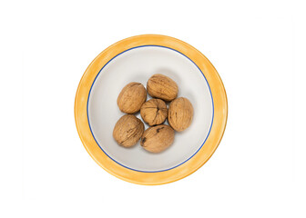 Fototapeta na wymiar Bowl With Six Shelled Walnuts, Isolated On White Background
