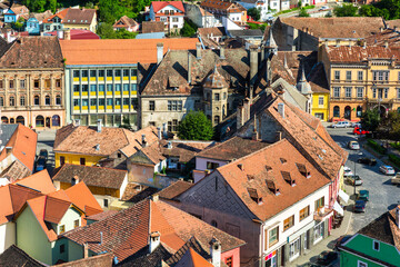 Aerial view of the old Sighisoara old town, in Transylvania, Romania - 758935354