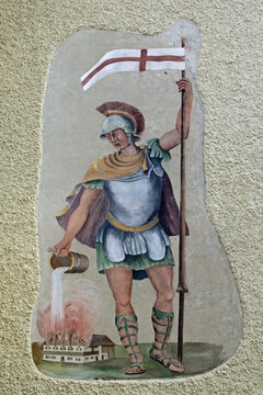 historical mural of a firefighter with a flag