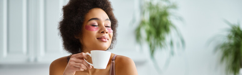 happy african american woman with eye patches standing in lingerie and enjoying coffee, banner - obrazy, fototapety, plakaty