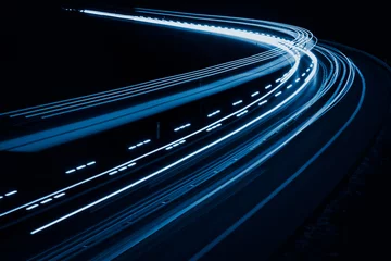 Fototapeten blue car lights at night. long exposure © Krzysztof Bubel