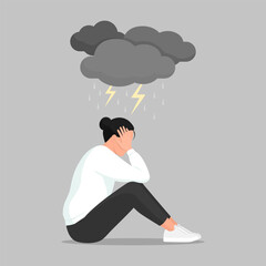 Depressed woman with clouds above her