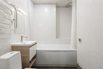 modern bathroom room with toilet and washing machine