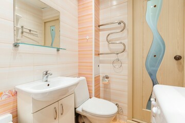 modern bathroom room with toilet and washing machine