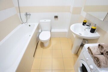 Fototapeta premium modern bathroom room with toilet and washing machine