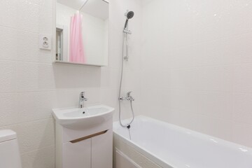 modern bathroom room with toilet and washing machine