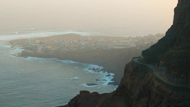 Aerial drone view of coastline, cliffs and road from Fontainhas looking at Ponta do Sol, North of Santo Antao island, Cape Verde