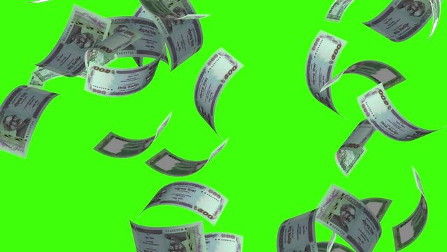 Five hundred Bangladeshi Taka, BDT, Tk, bills are falling on Green background. Great use for money and finance related concepts. Green Screen.