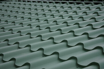 Green metal roof tile wave © Sergey