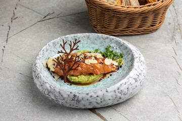 Salmon tartare with avocado, top view