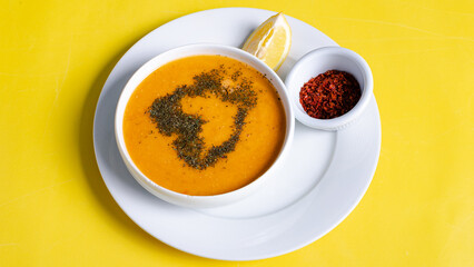 Lentil soup bowl isolated top view