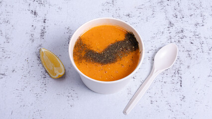 Lentil soup bowl isolated top view