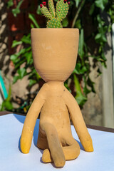 A souvenir sold to tourists at the São Luís market, Maranhão, Brazil, is the anthropomorphic...