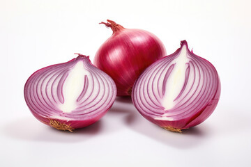 Whole and sliced red onions with visible layers, on a neutral background.