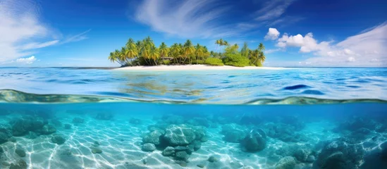  Crystal clear ocean water on a tropical island beach in the Indian Ocean. Best interior design inspiration. © Vusal